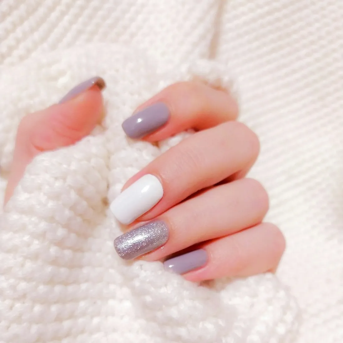 Soft pink gel manicure on a client's hands